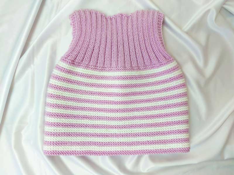 В'язана дитяча жилетка для дівчинки рожевого кольору