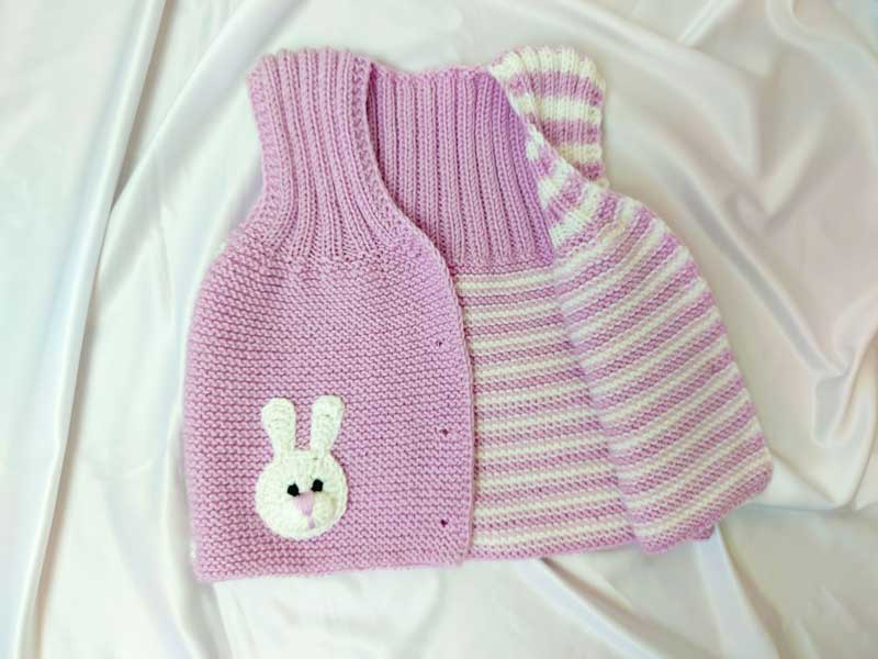В'язана дитяча жилетка для дівчинки рожевого кольору
