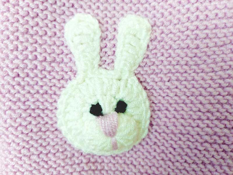 В'язана дитяча жилетка для дівчинки рожевого кольору